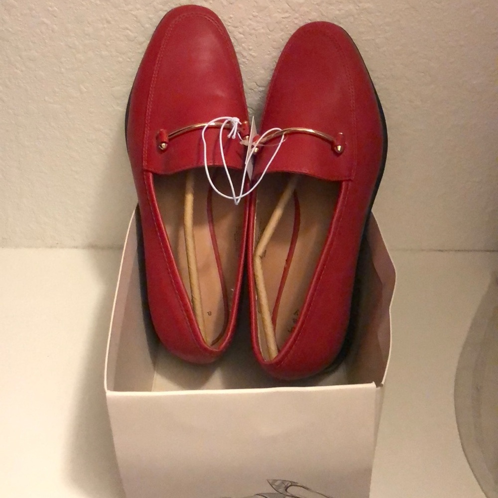 Red loafer style shoes